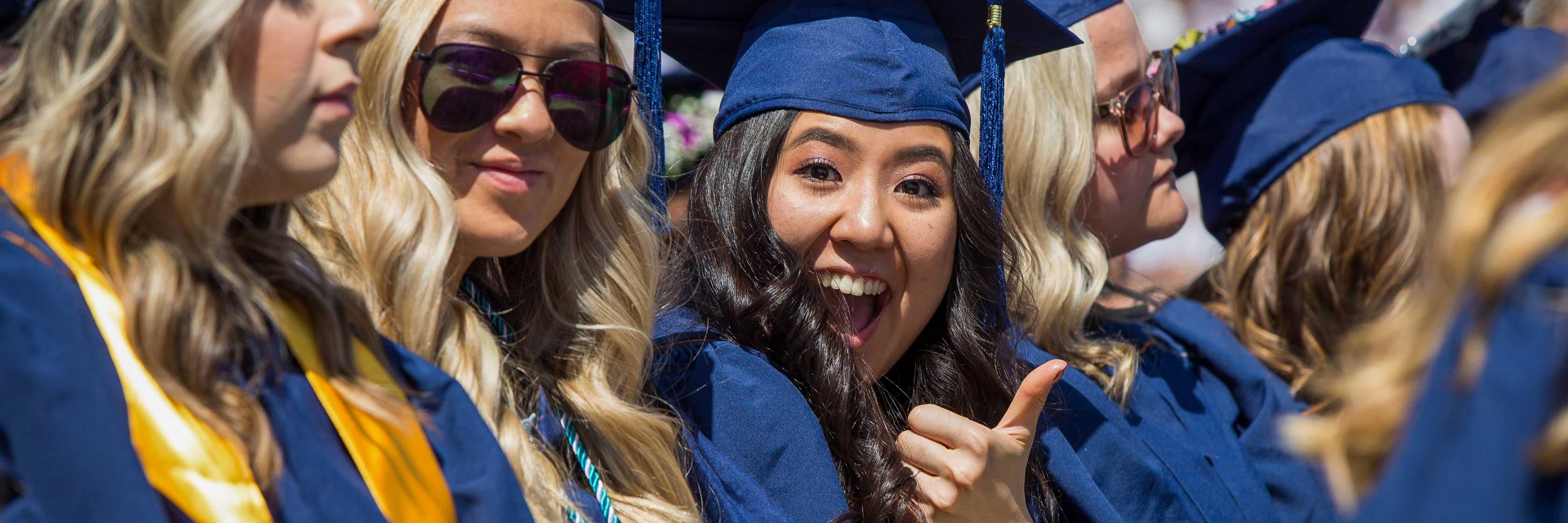 UNC graduate gives a thumbs up